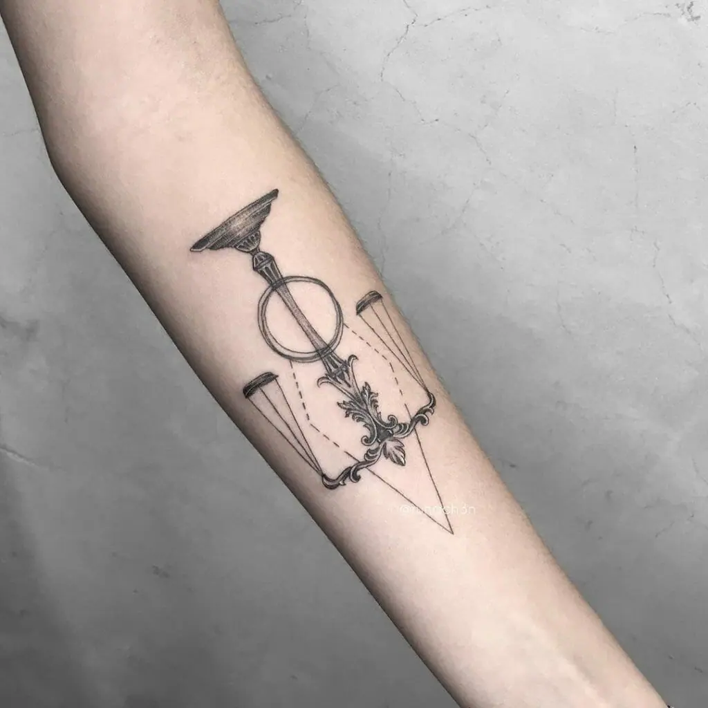 Libra zodiac sign tattoo on forearm