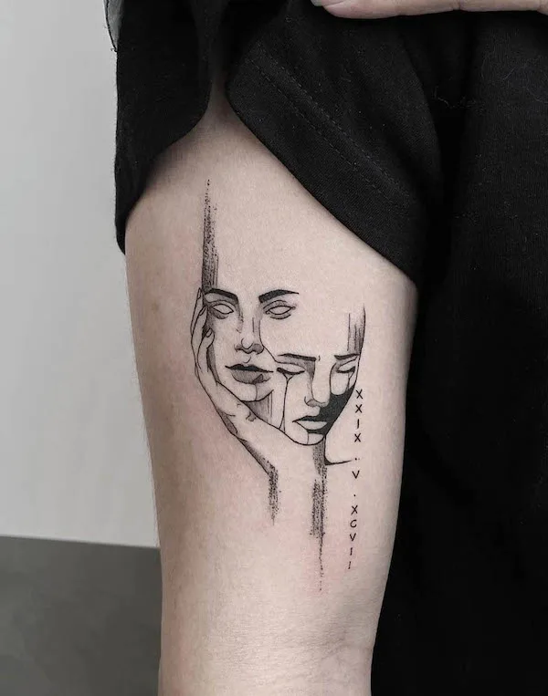 Gemini tattoo on arm