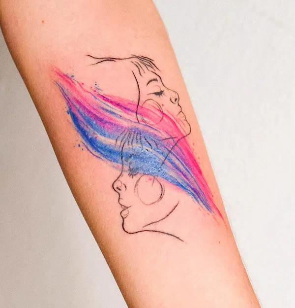 Smear of colored tattoo zodiac sign Gemini