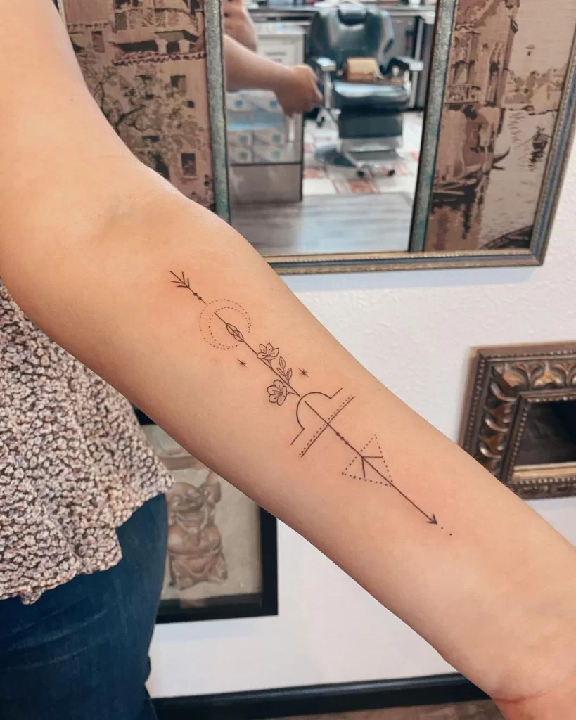 Libra tattoo on the forearm for women