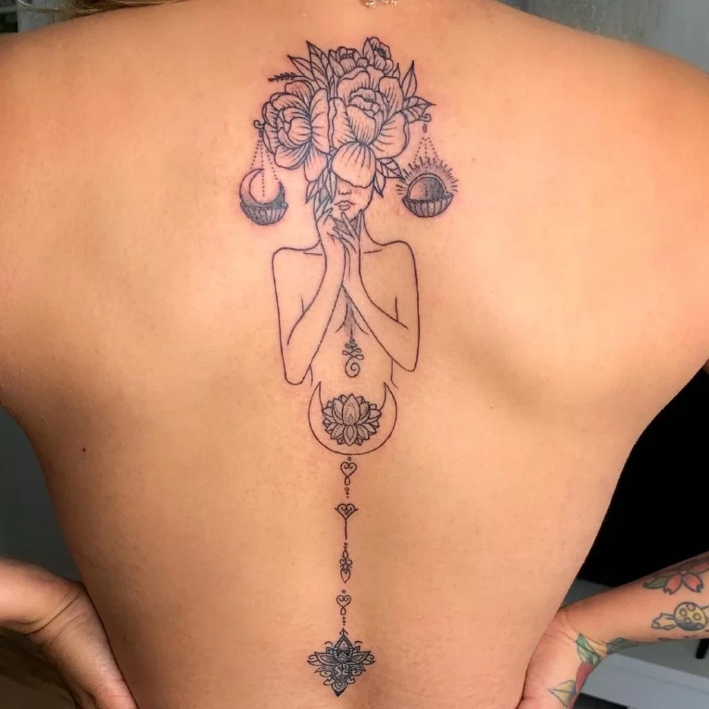 Beautiful Libra tattoo on the back for women