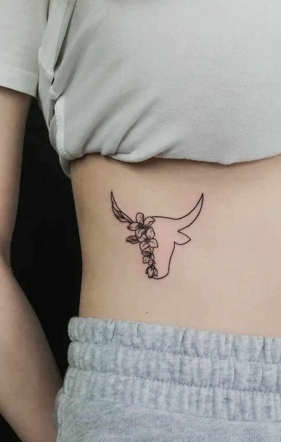 Taurus zodiac sign tattoo on the side for women