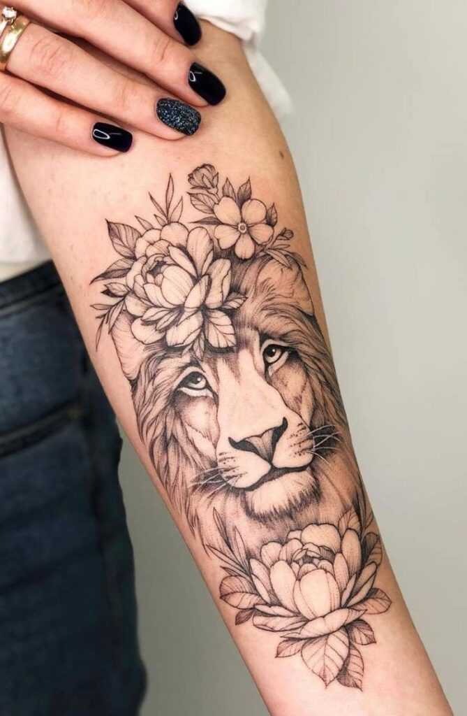 Tattoo of the zodiac sign lion on the forearm for women