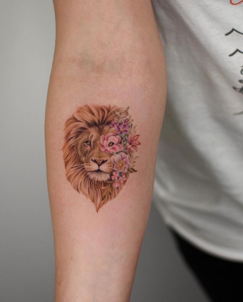 Tattoo of the zodiac sign lion on the forearm for women