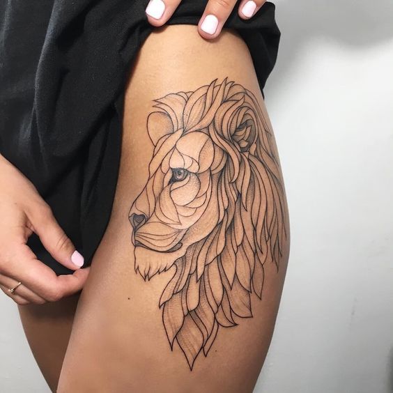 Tattoo of the zodiac sign lion on the hip for women