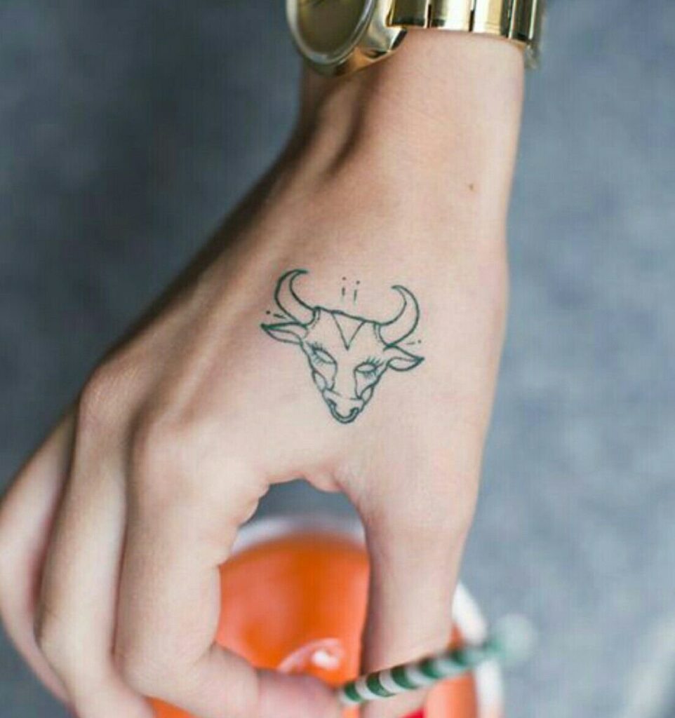 Taurus zodiac sign tattoo on the hand for women