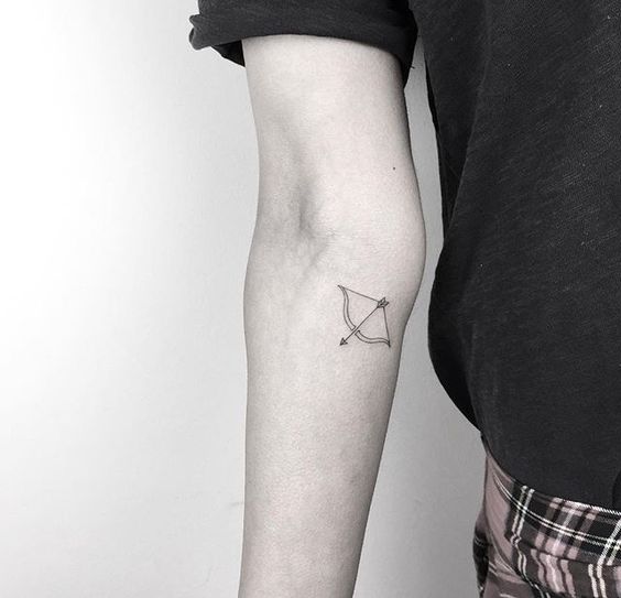 Tattoo of the zodiac sign Sagittarius on the forearm for men