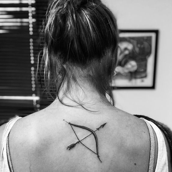 Sagittarius zodiac sign tattoo on the back for women