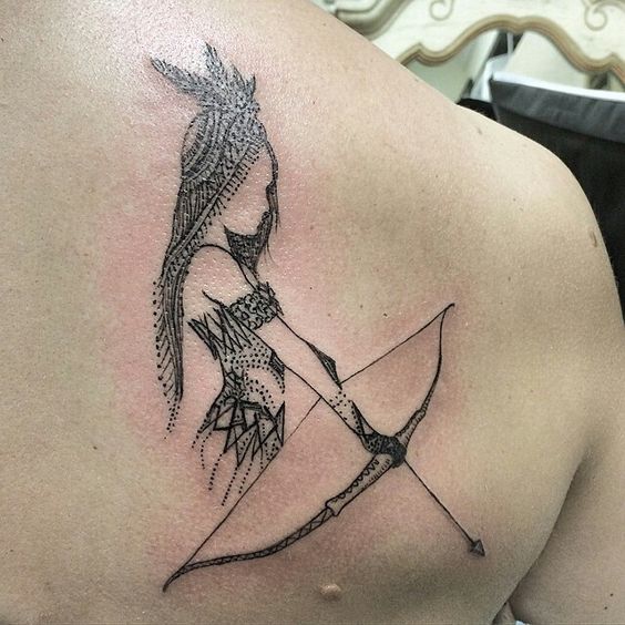 Sagittarius zodiac sign tattoo on the shoulder blade for women