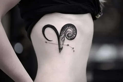 Tattoo of the zodiac sign of Aries on the side for women