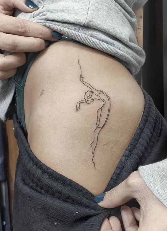 Ballerina tattoo on the hip for women