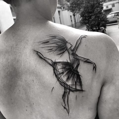 Ballerina tattoo on the shoulder blade for men