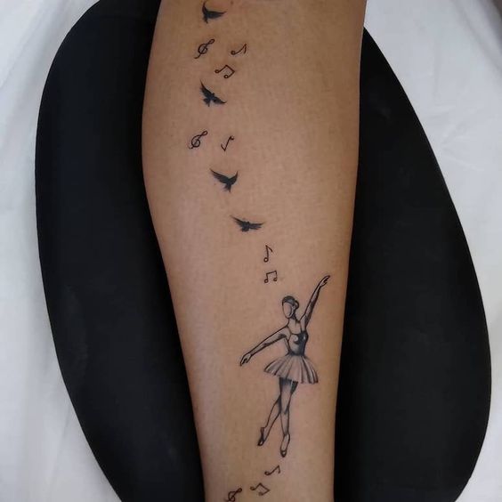 Ballerina tattoo on the shin for women