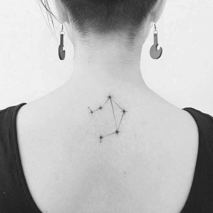 Tattoo the constellation sign of the zodiac Libra on the back for women