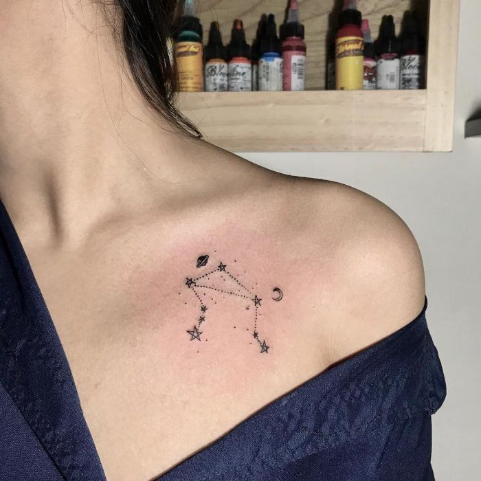 Tattoo the constellation sign of the zodiac Libra on the collarbone for women