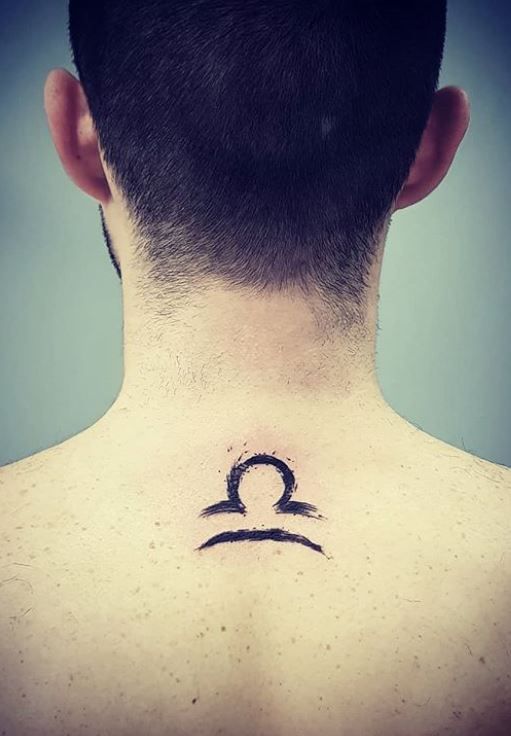 Tattoo symbol of the zodiac sign Libra on the back for men