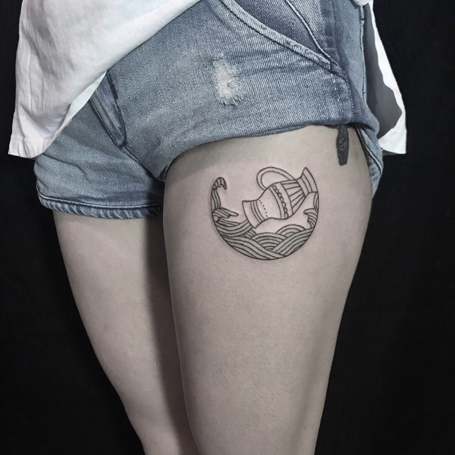 Aquarius zodiac sign tattoo on the hip for women