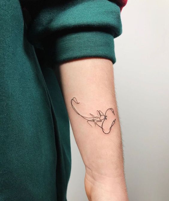 Tattoo of the zodiac sign of a scorpion on the forearm for women