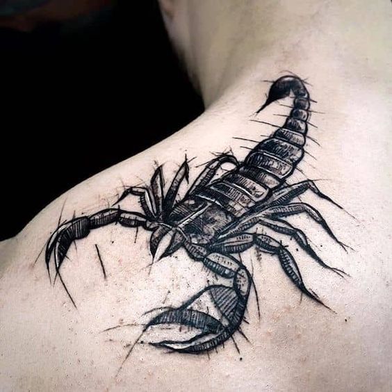 Tattoo of the zodiac sign of a scorpion on the shoulder for men