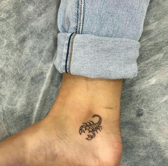 Tattoo of the zodiac sign of the scorpion on the ankle for men