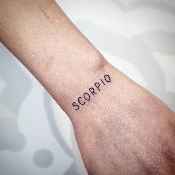 Tattoo of the zodiac sign of a scorpion on the wrist for men