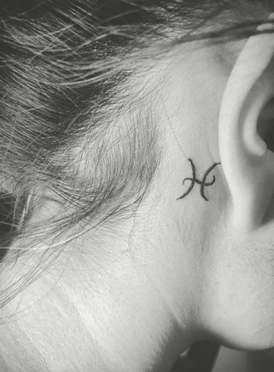 Fish zodiac sign tattoo on the neck for women