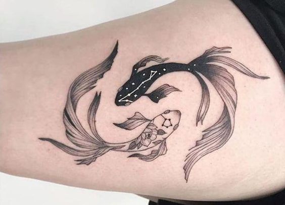 Tattoo the constellation sign of the zodiac fish on the leg