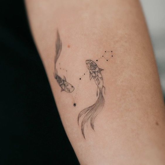 Tattoo the constellation sign of the zodiac fish on the leg