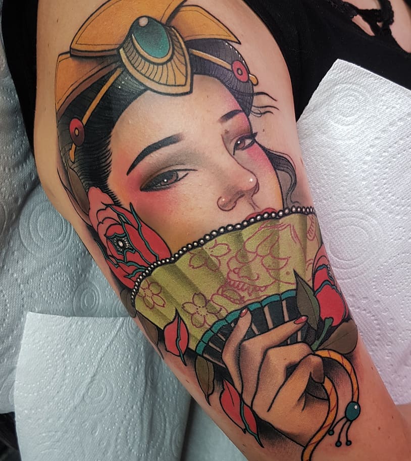 Geisha tattoo on the thigh