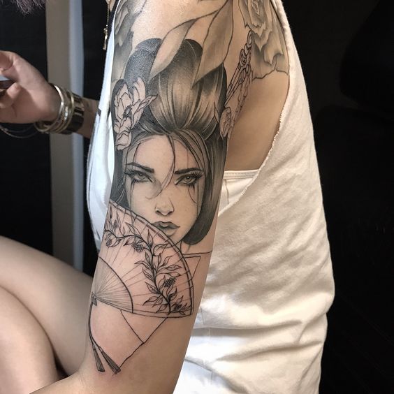 Geisha tattoo on the shoulder for women