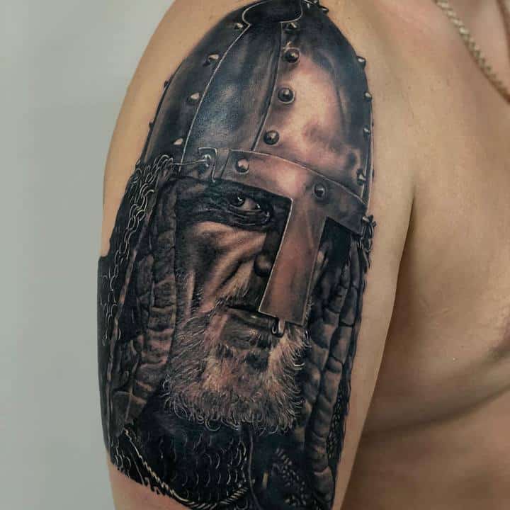 Tattoo of a bogatyr on the shoulder for men