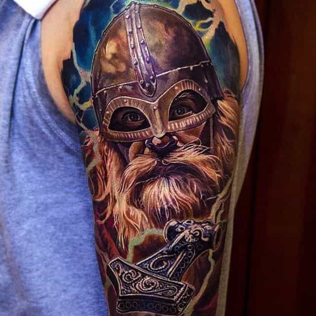 Tattoo of a bogatyr on the shoulder for men