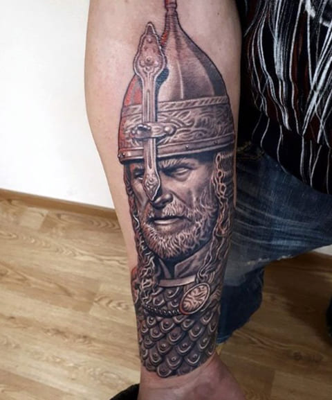 Tattoo of a bogatyr on the forearm for men