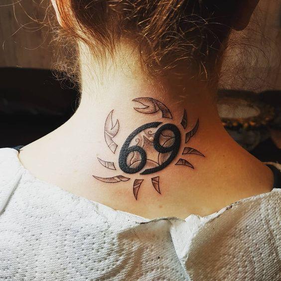 Zodiac sign cancer tattoo on the back of the head for women