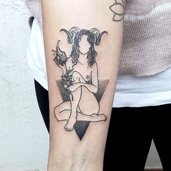 Tattoo of the zodiac sign Aries on the forearm for women