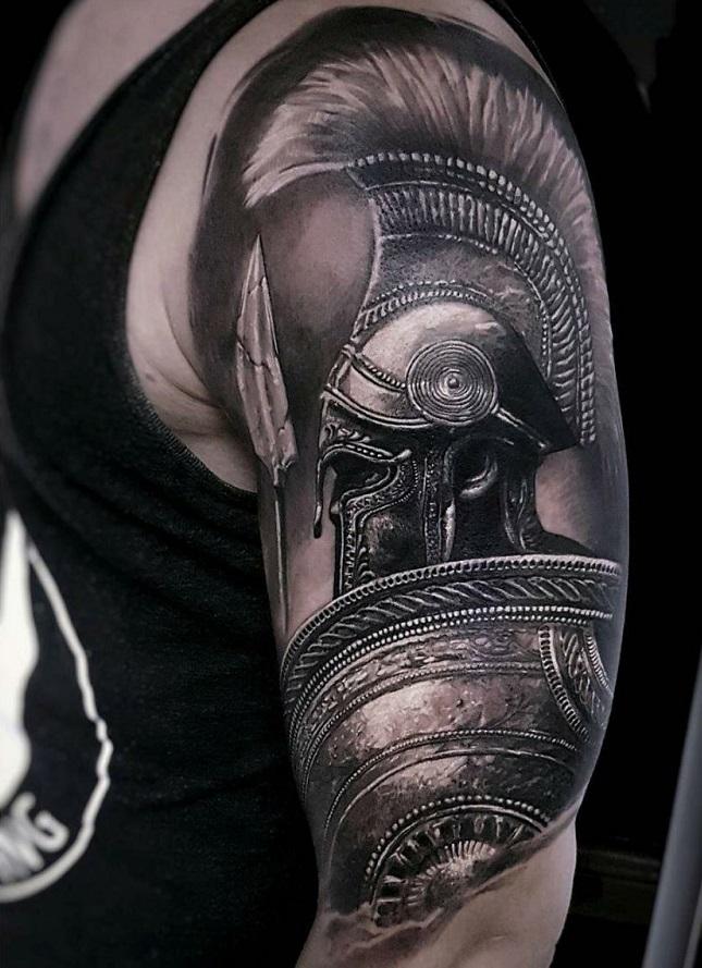 Tattoo of a gladiator on the shoulder for men