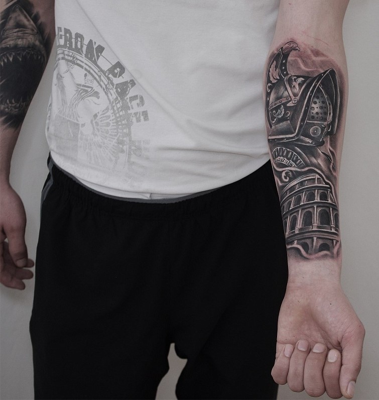 Tattoo of a gladiator on the forearm for men