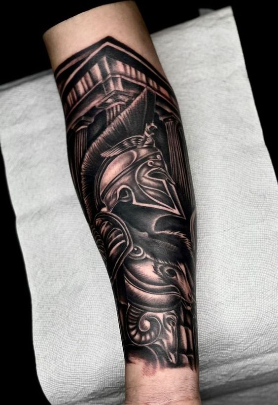 Tattoo of a gladiator on the arm for men