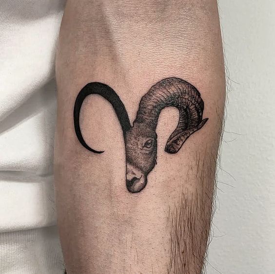 Tattoo of the zodiac sign of Aries on the forearm for men