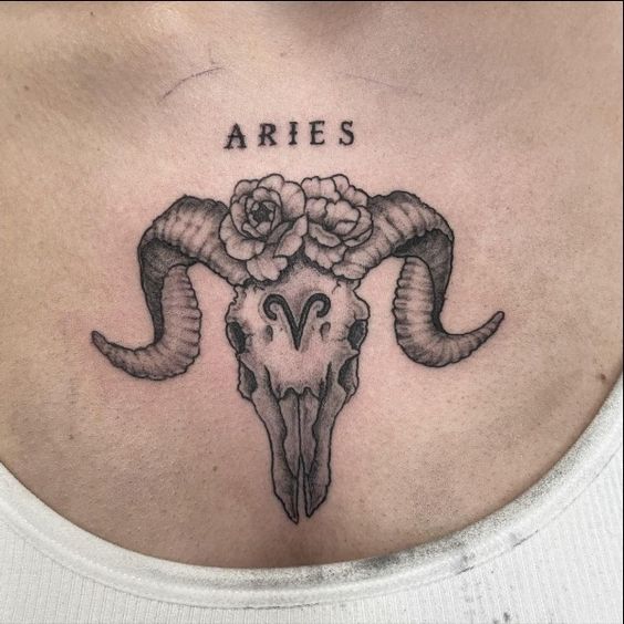 Aries zodiac sign tattoo on the chest for women