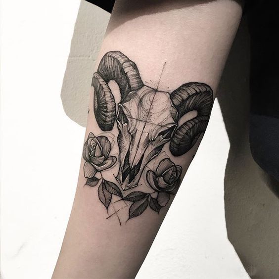 Tattoo of the zodiac sign Aries on the forearm for women