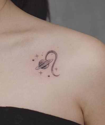 Tattoo symbol of the zodiac sign lion on the collarbone for women