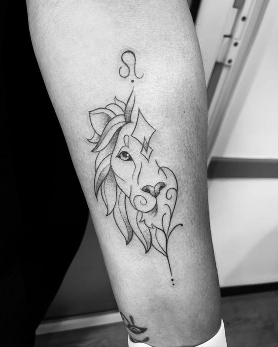 Tattoo of the zodiac sign lion on the leg