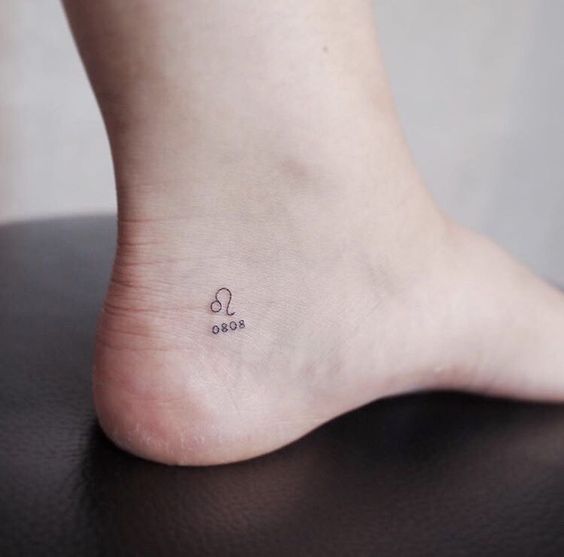 Tattoo symbol of the zodiac sign lion on the ankle