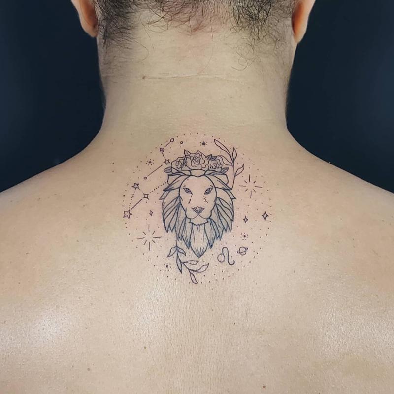 Tattoo of the constellation zodiac sign lion on the back for men