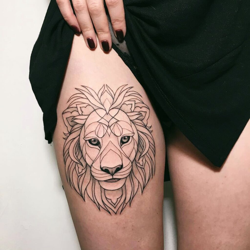 Tattoo of the zodiac sign lion on the hip for women