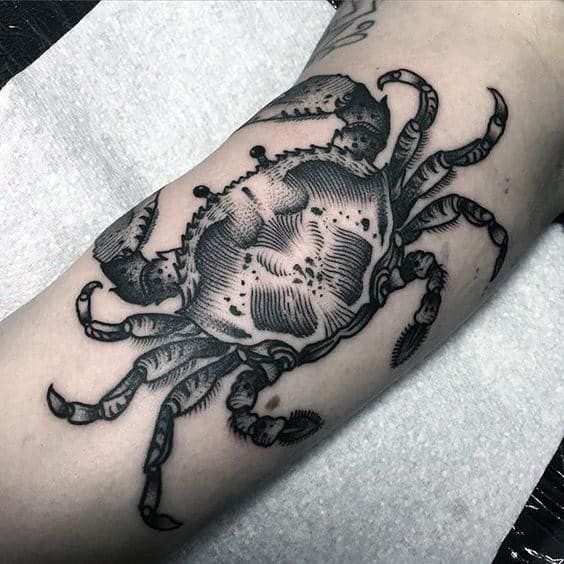 Tattoo of the zodiac sign Cancer on the biceps for men Tattoo of the zodiac sign Cancer on the biceps for men