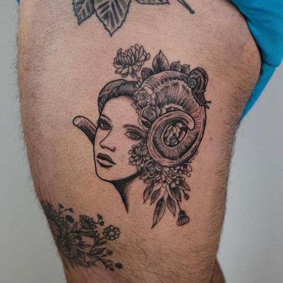 Tattoo of the zodiac sign of Aries on the hip for men