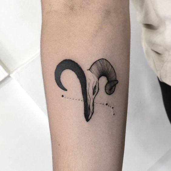 Tattoo of the zodiac sign of Aries on the forearm for men