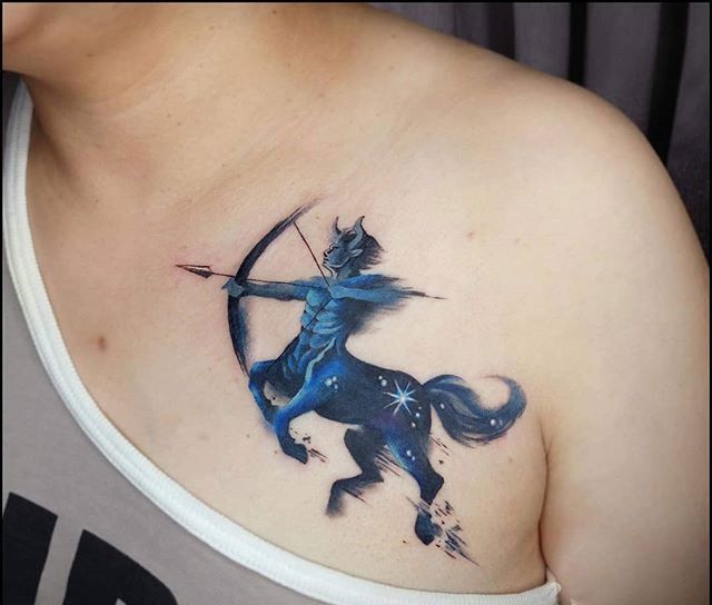 Sagittarius zodiac sign tattoo on the collarbone for women